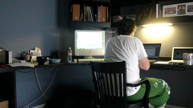 Founder working from home office desk — S-corp accountable plan expense reimbursement setup