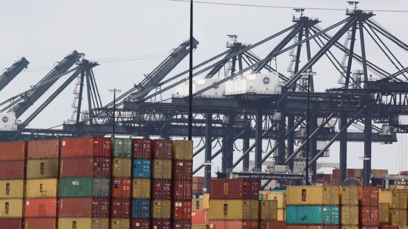 Shipping containers at US port representing import tariff exposure for small business operators in 2026
